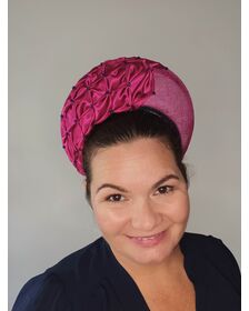 A picture of a Pink Smocked Millinery Crown by Melissa Rath Millinery listed on hatporium