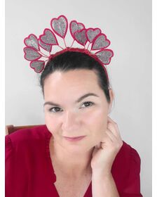 A picture of a red heart headband in pleather and felt by Melissa Rath Millinery