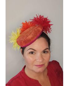 A picture of an Orange, Red and Yellow Millinery Pillbox by Melissa Rath Millinery listed on Hatporium