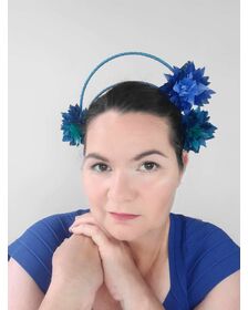 A picture of a blue and green feathered halo crown by Melissa Rath Millinery listed on Hatporium