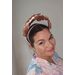 A picture of a Rose Gold Leaf Headband by Melissa Rath Millinery