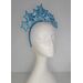 A picture of a blue headband with stars by Melissa Rath Millinery