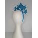 A picture of a blue headband with stars by Melissa Rath Millinery