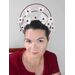 A picture of a red and white halo crown by Melissa Rath Millinery